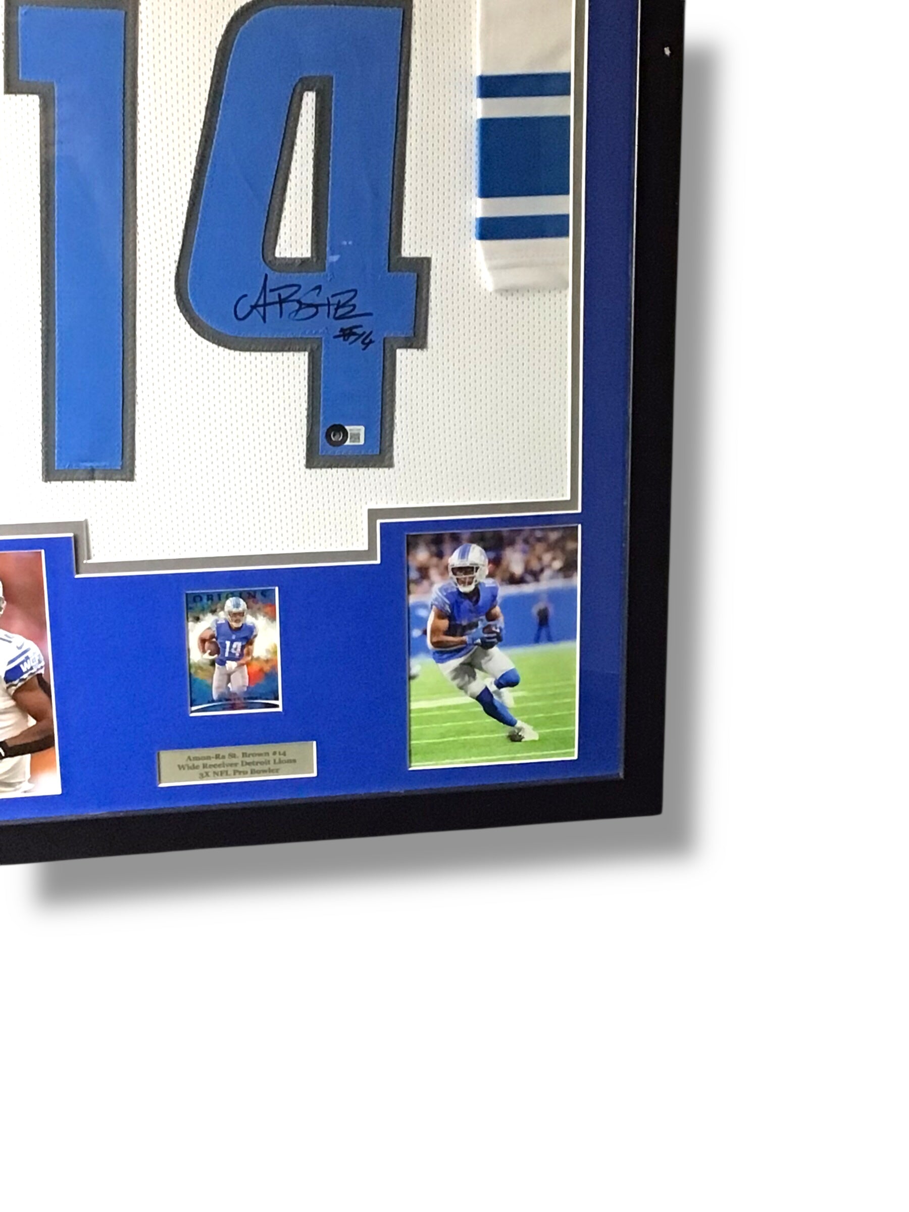 Framed Amon-Ra St. Brown Autographed Jersey w/ Beckett Authentication & RC Sports Card
