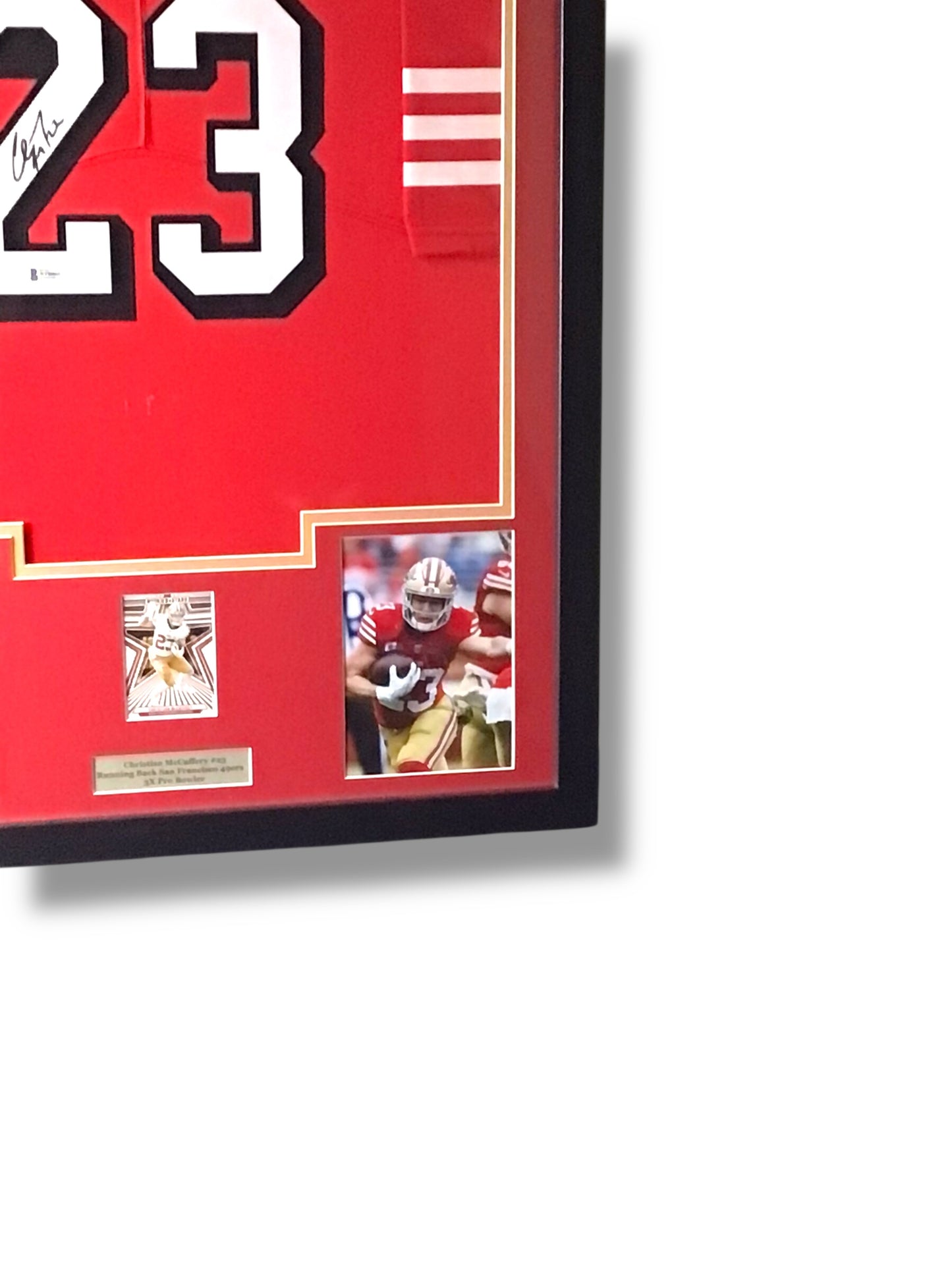 Framed Christian McCaffrey Autographed Jersey w/ Beckett Authentication & Sports Card