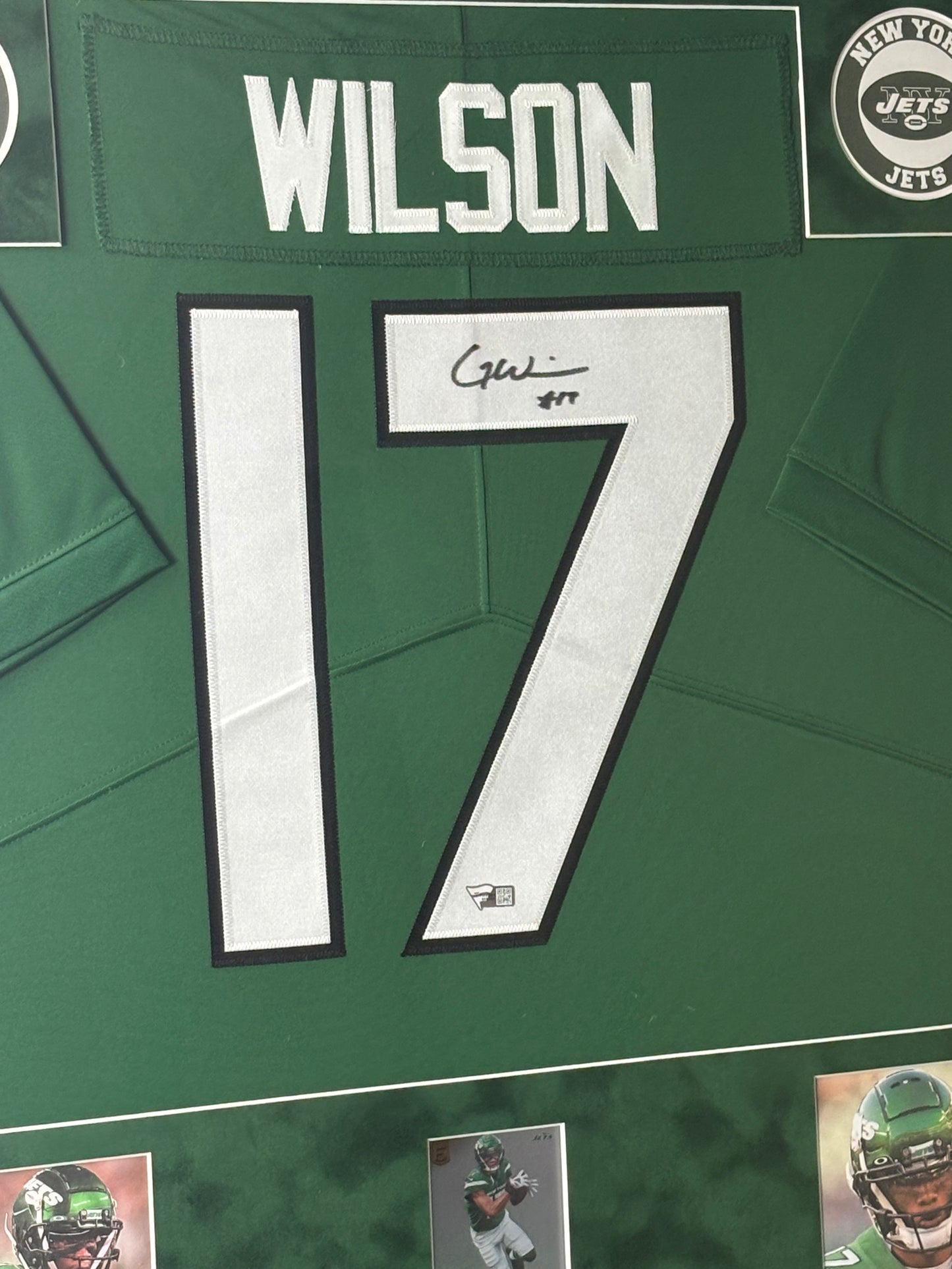 Framed Garrett Wilson Autographed N.Y. Jets Jersey w/ Fanatics Auth. & Sports Card