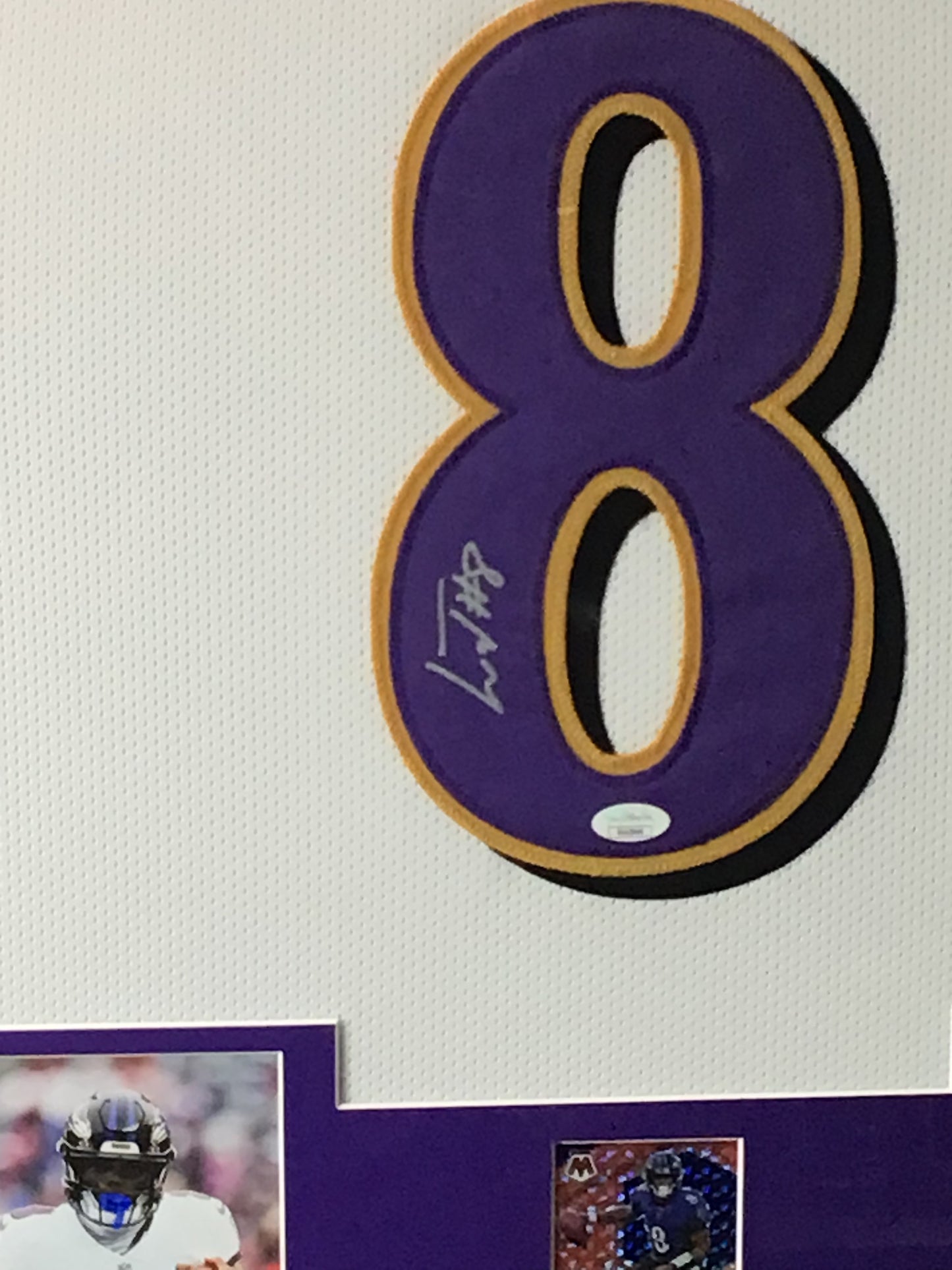 Framed Lamar Jackson Autographed Jersey w/ JSA Authentication & Sports Card