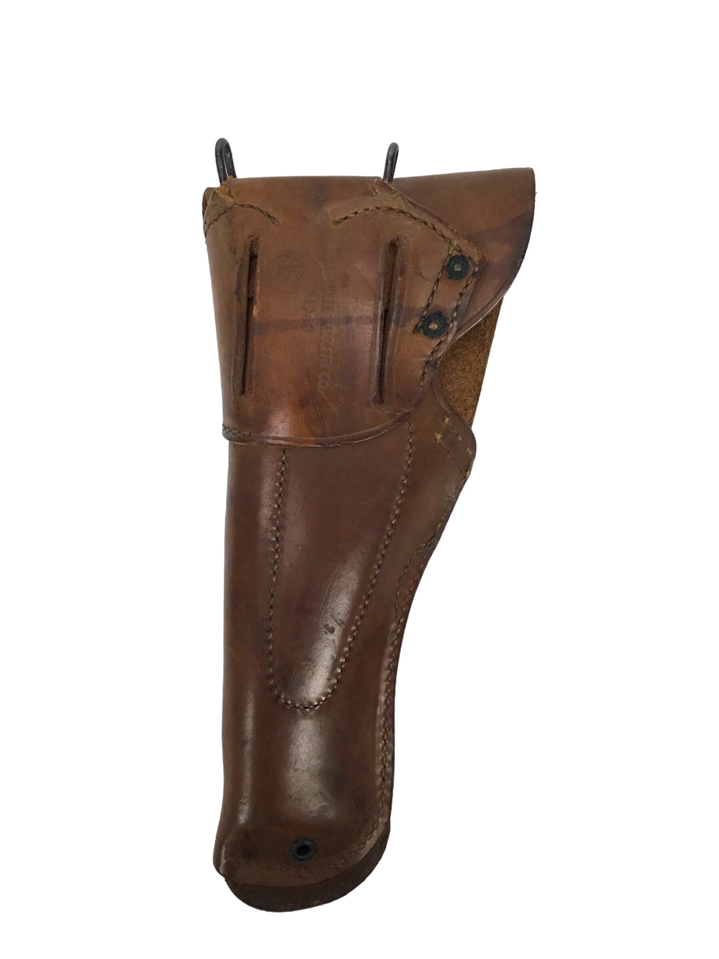 U.S. WWII leather pistol holster marked "U.S." on flap, further marked "Milwaukee Saddlery Co., 1942"