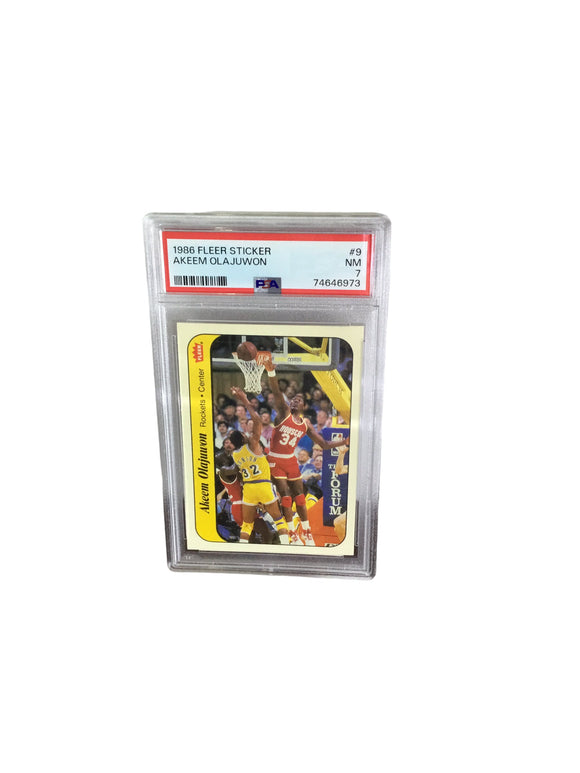 1986-87 Fleer Basketball Sticker AKEEM OLAJUWON RC #9 PSA 7 NM Rockets Rookie