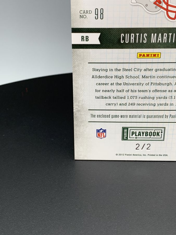 2011 Panini Playbook Grass Roots Materials #98 Curtis Martin/2 Football Card