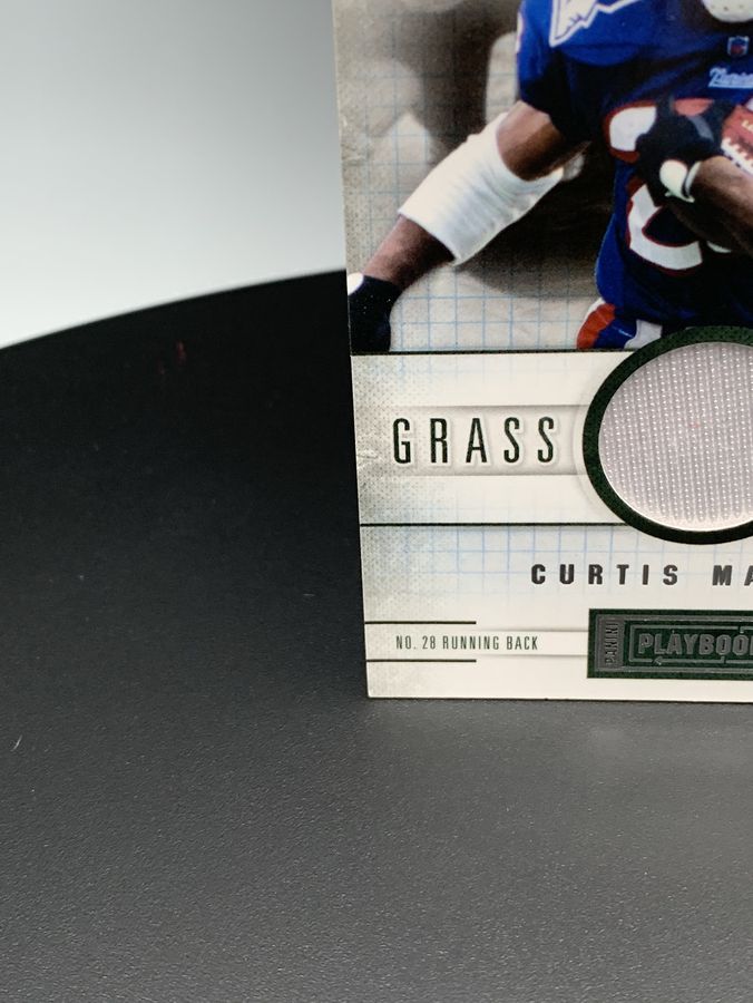 2011 Panini Playbook Grass Roots Materials #98 Curtis Martin/2 Football Card