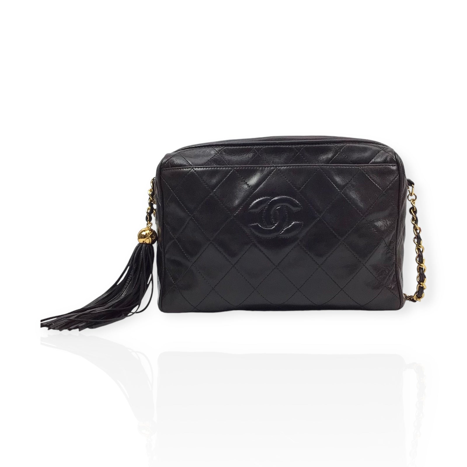 Authentic Chanel Black Lambskin Camera Bag - Iconic CC Logo with Tassel Detail