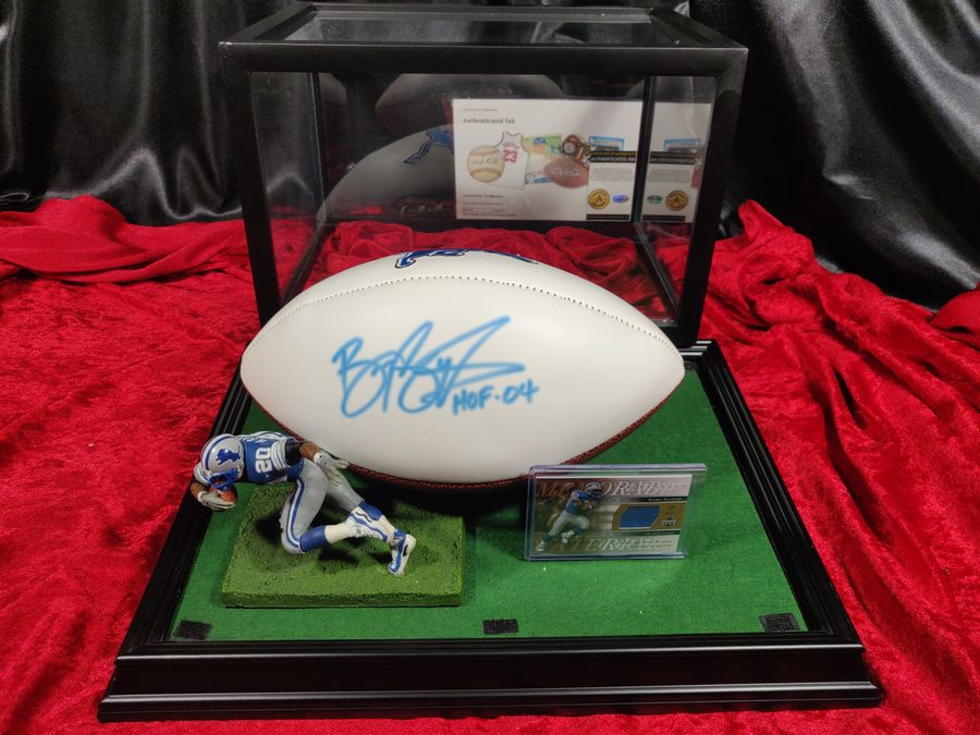 Barry Sanders Detroit Lions Autographed Football Shadowbox with Card and Figure