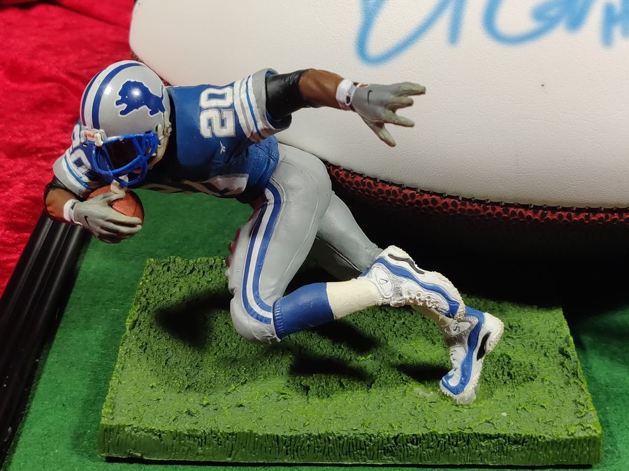 Barry Sanders Detroit Lions Autographed Football Shadowbox with Card and Figure