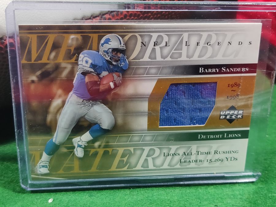 Barry Sanders Detroit Lions Autographed Football Shadowbox with Card and Figure