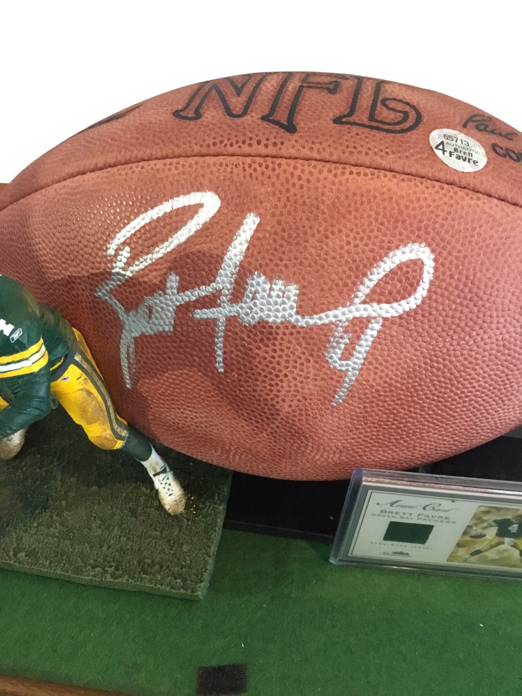 Brett Favre Autographed Football with #Jersey Card 132/999 and Figure (Certified)