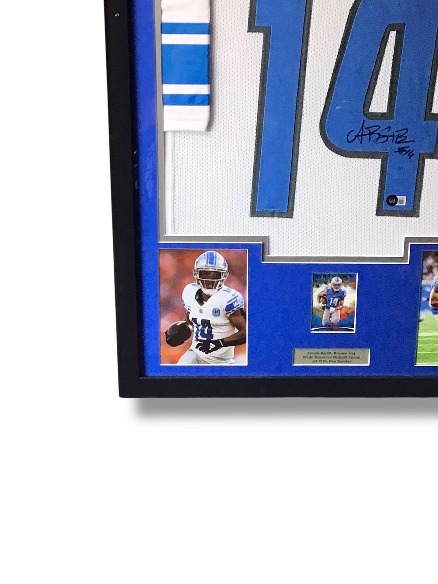 Framed Amon-Ra St. Brown Autographed Jersey w/ Beckett Authentication & RC Sports Card