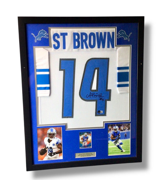 Framed Amon-Ra St. Brown Autographed Jersey w/ Beckett Authentication & RC Sports Card