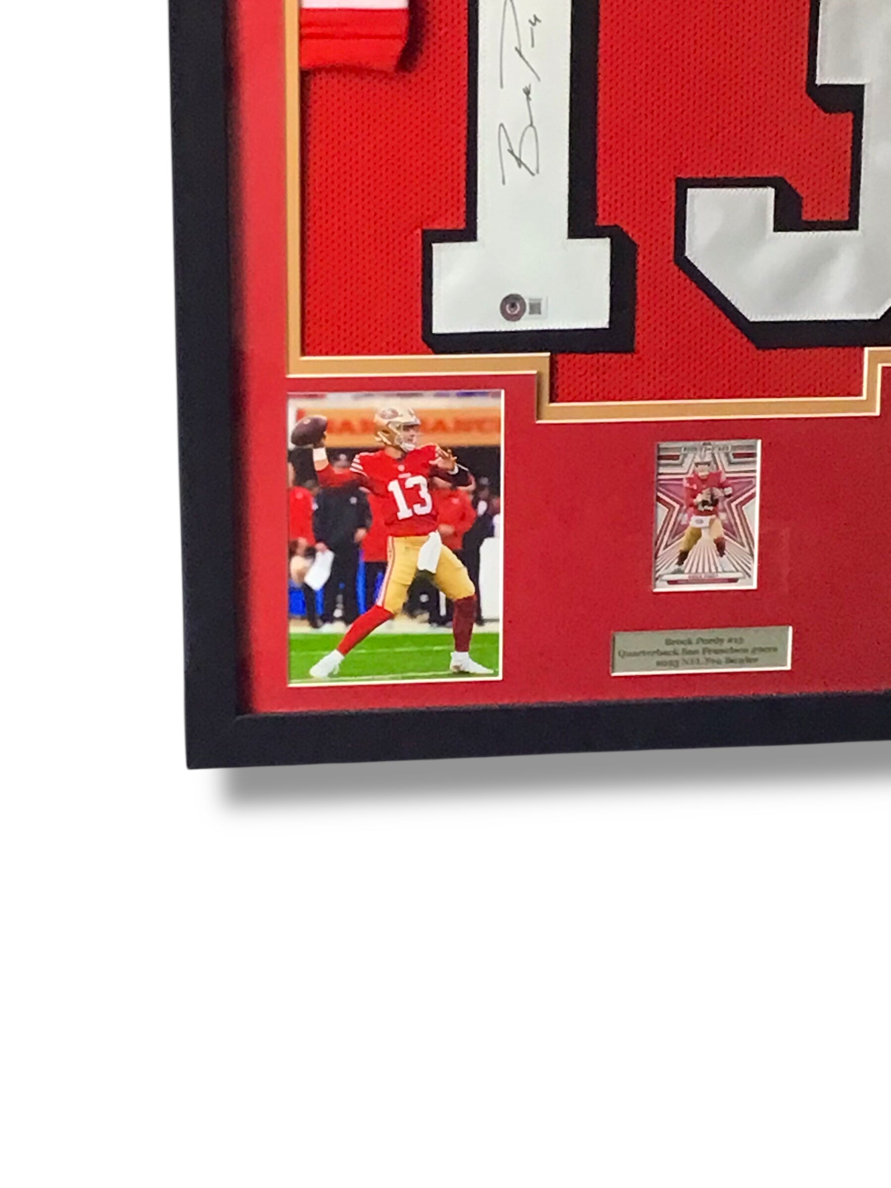 Framed Brock Purdy Autographed Jersey w/ Beckett Authentication & Sports Card