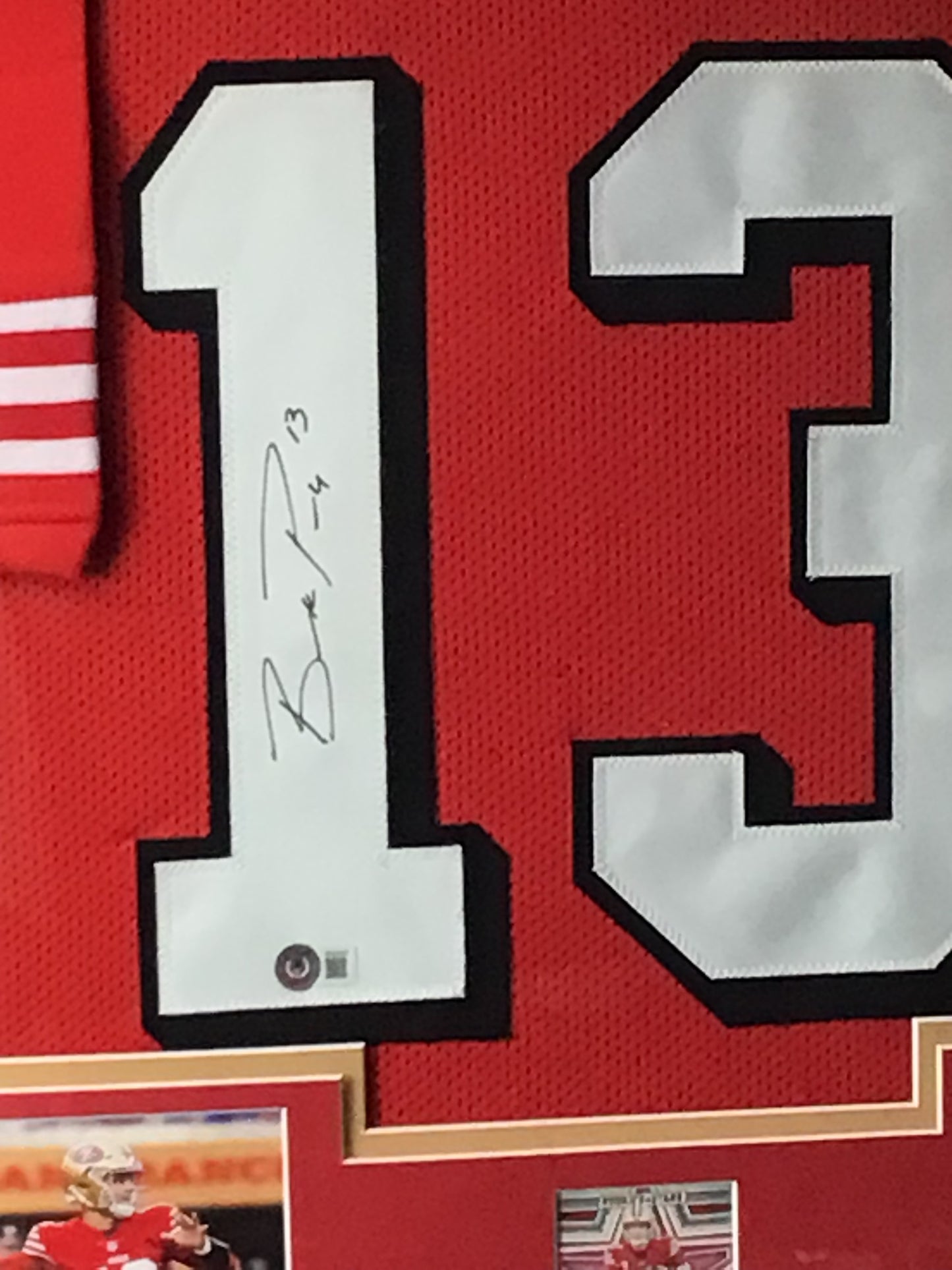 Framed Brock Purdy Autographed Jersey w/ Beckett Authentication & Sports Card