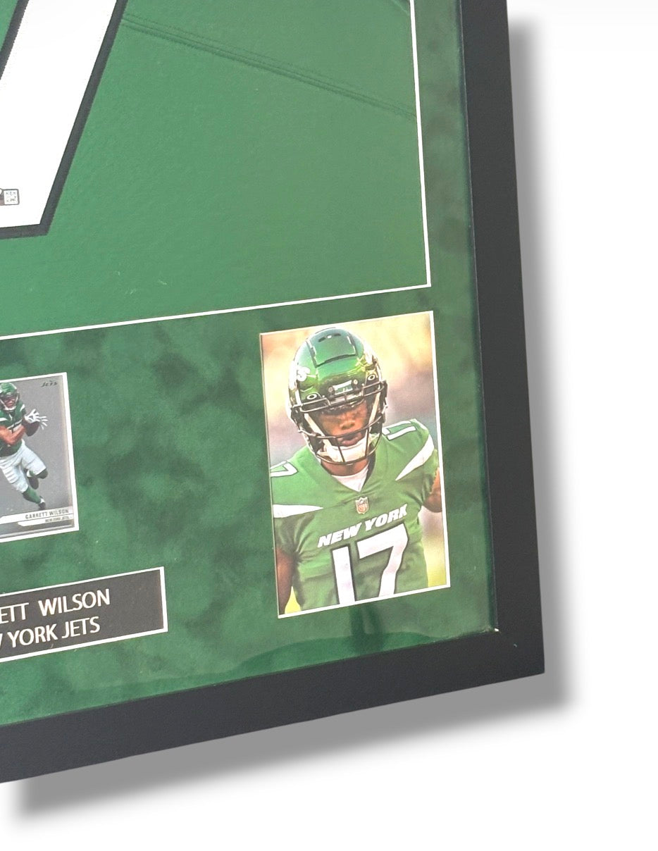 Framed Garrett Wilson Autographed N.Y. Jets Jersey w/ Fanatics Auth. & Sports Card