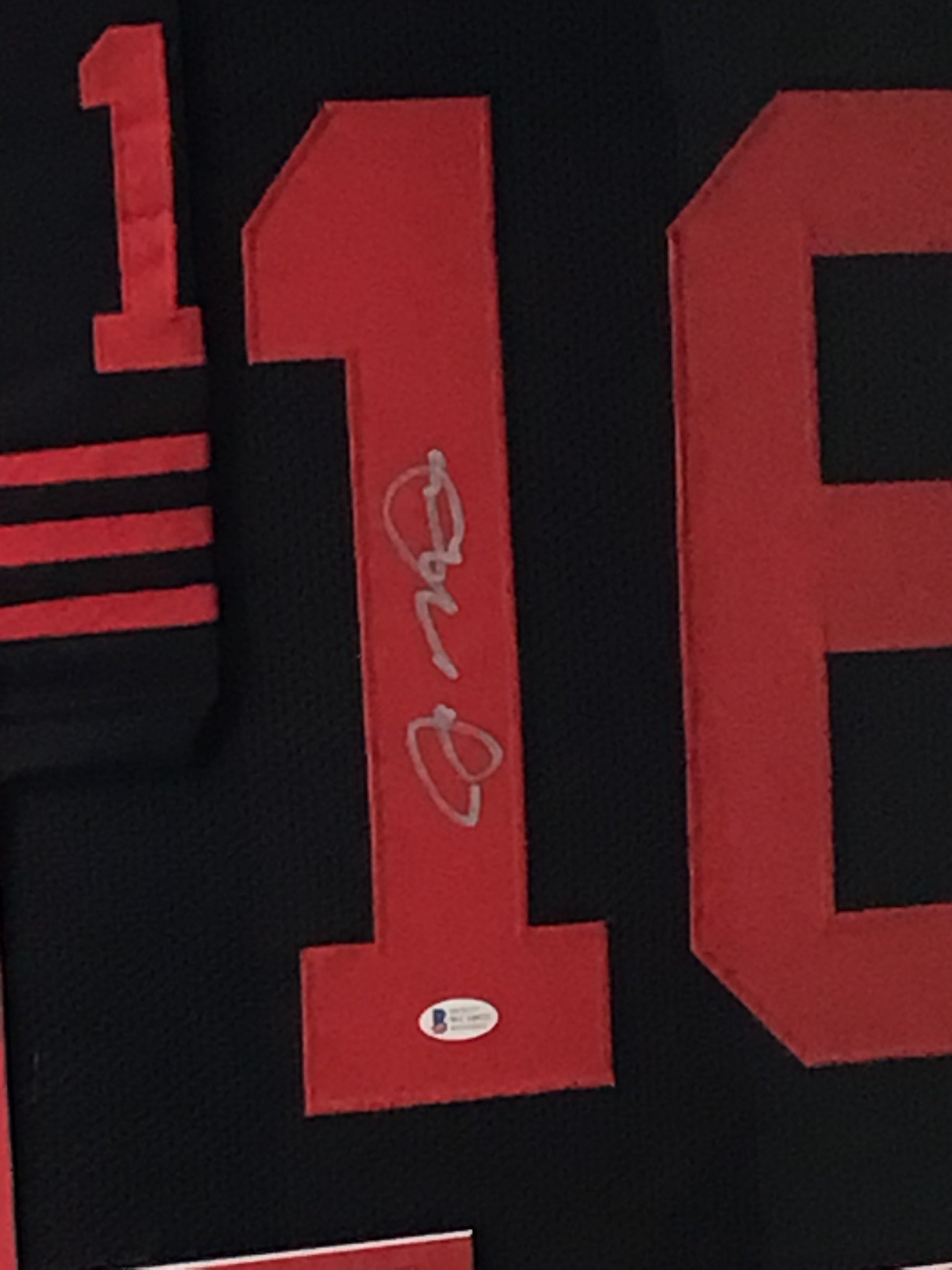 Framed Joe Montana Signed Jersey w/ Beckett Authentication & Rare Holo Optic Sports Card