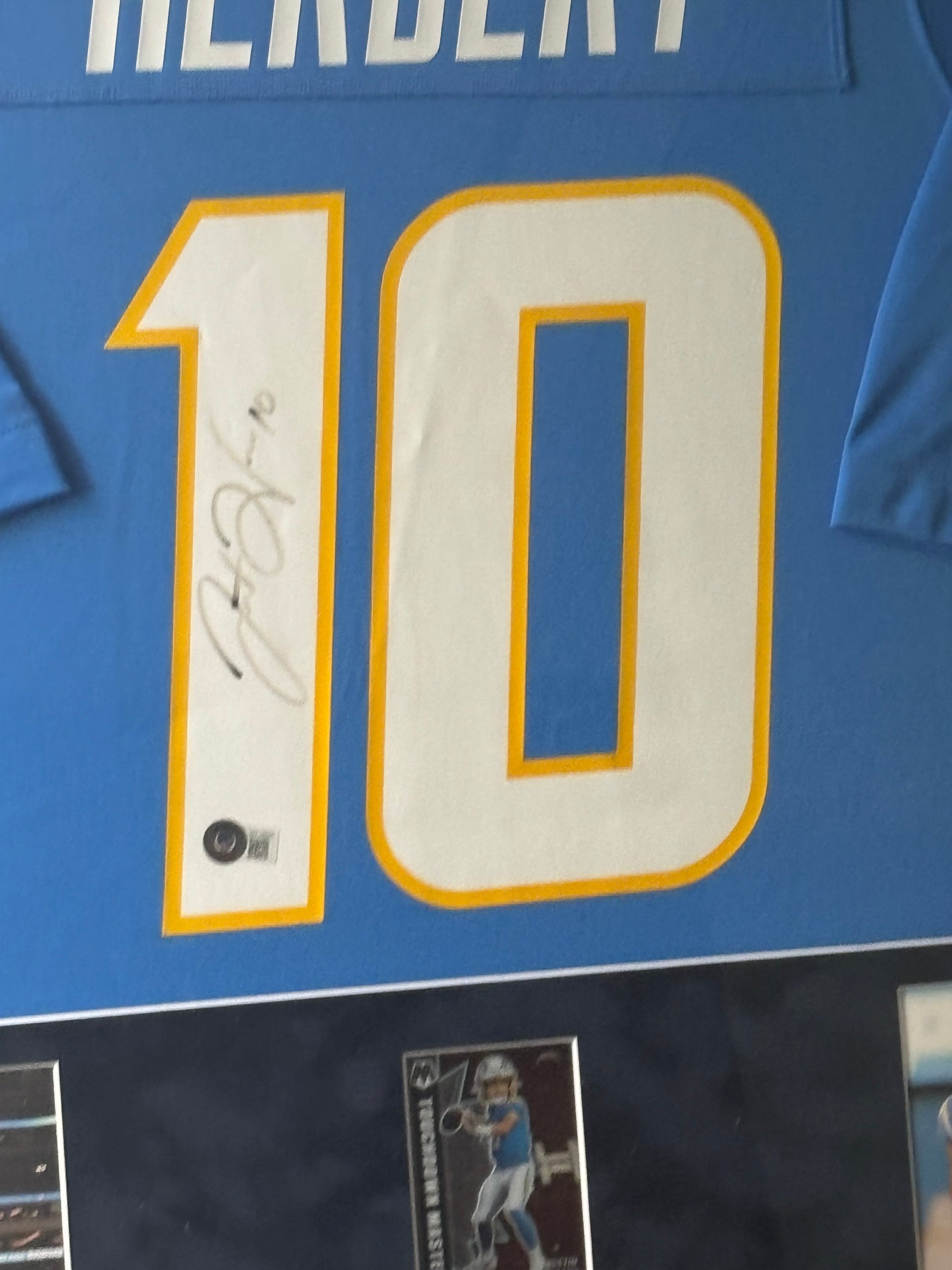 Framed Justin Herbert Autographed Nike Chargers Jersey w/ Beckett Auth. & Card