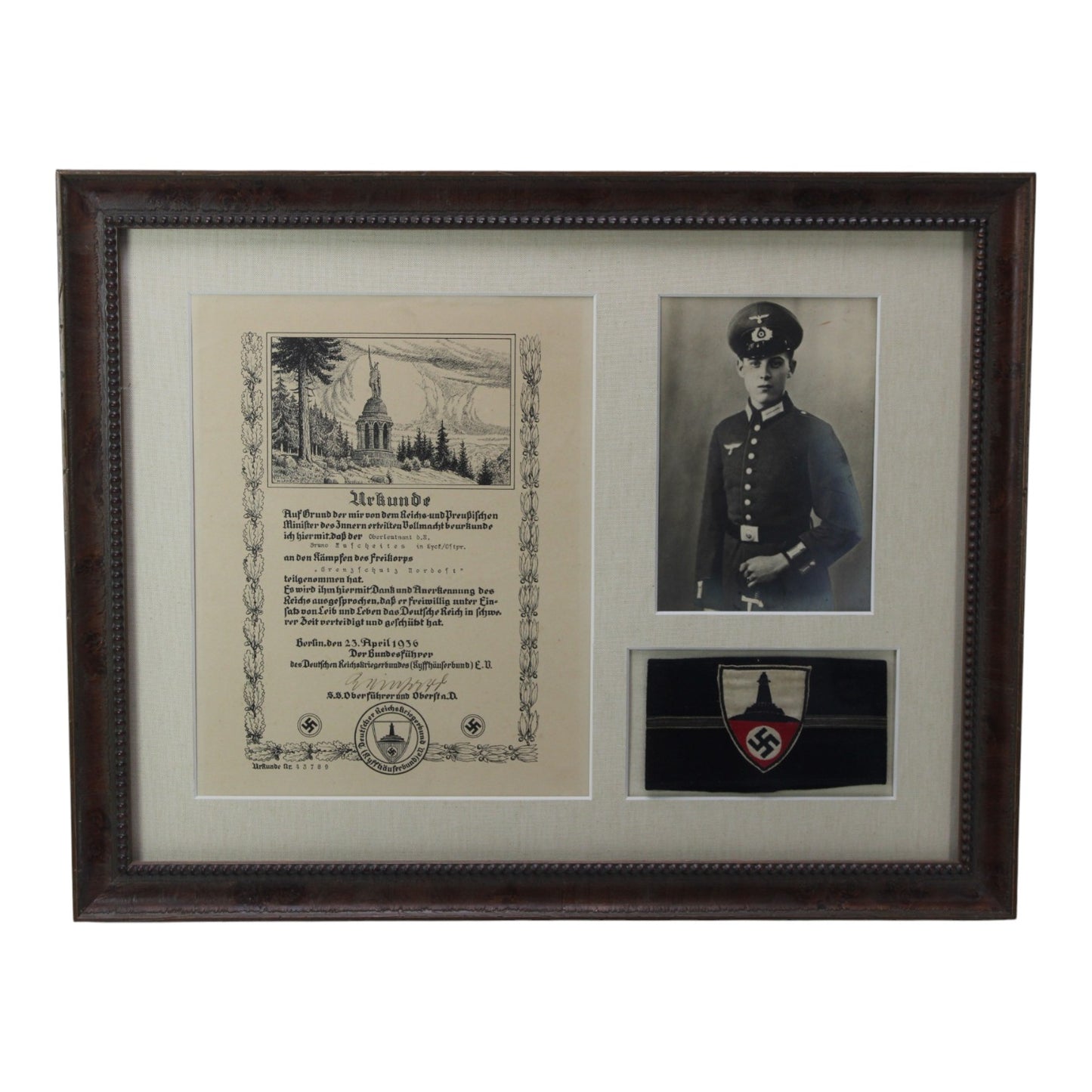 German WW2 Veteran Collection with rare Kyffhäuserbund Senior Officer Armband, Soldier Photo, and signed Award Document
