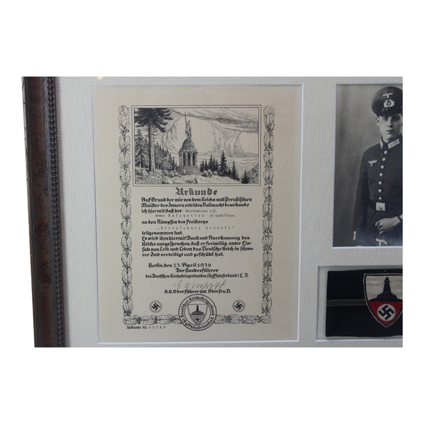 German WW2 Veteran Collection with rare Kyffhäuserbund Senior Officer Armband, Soldier Photo, and signed Award Document