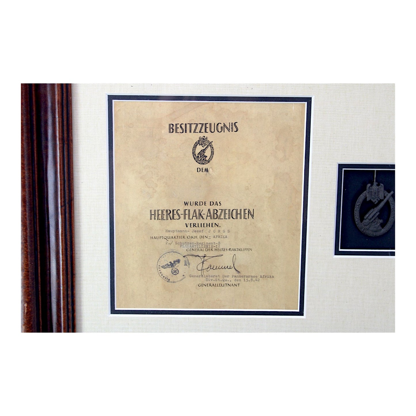 Afrika Korps German WW2 Collection with Rommel signed Order! – Collection includes a photo of the German Afrika Korps Soldier, (2) of his Afrika Korps Shoulder Boards Uniform removed, and Army Flak Badge with Rommel signed Award Document.