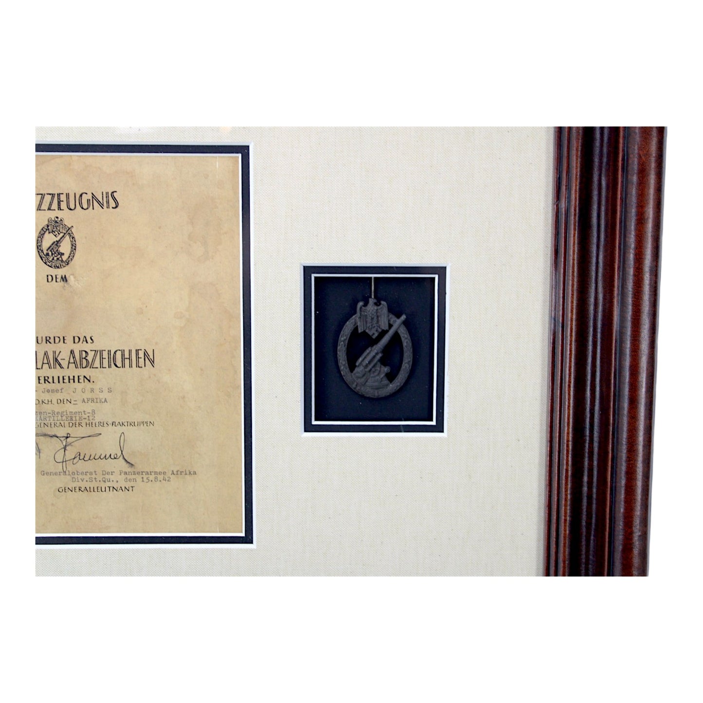 Afrika Korps German WW2 Collection with Rommel signed Order! – Collection includes a photo of the German Afrika Korps Soldier, (2) of his Afrika Korps Shoulder Boards Uniform removed, and Army Flak Badge with Rommel signed Award Document.