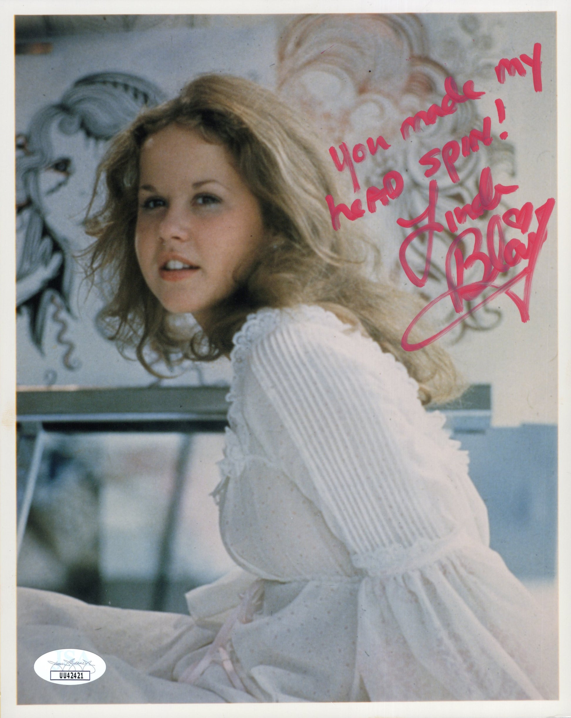 Linda Blair Signed Photo 8x10 Personalized "You made my head spin!", Linda Blair Autograph as Regan MacNeil in The Exorcist wearing White Dress on Bed, JSA and PSA Letter Double Certified Authentic UU42421
