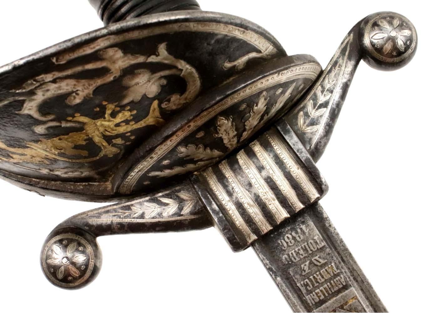 Spanish or Mexican 1880 Senior Officer's Sword with Ancestral 18th C. heavily silvered and gold overlaid Iron Hilt and Toledo Blade