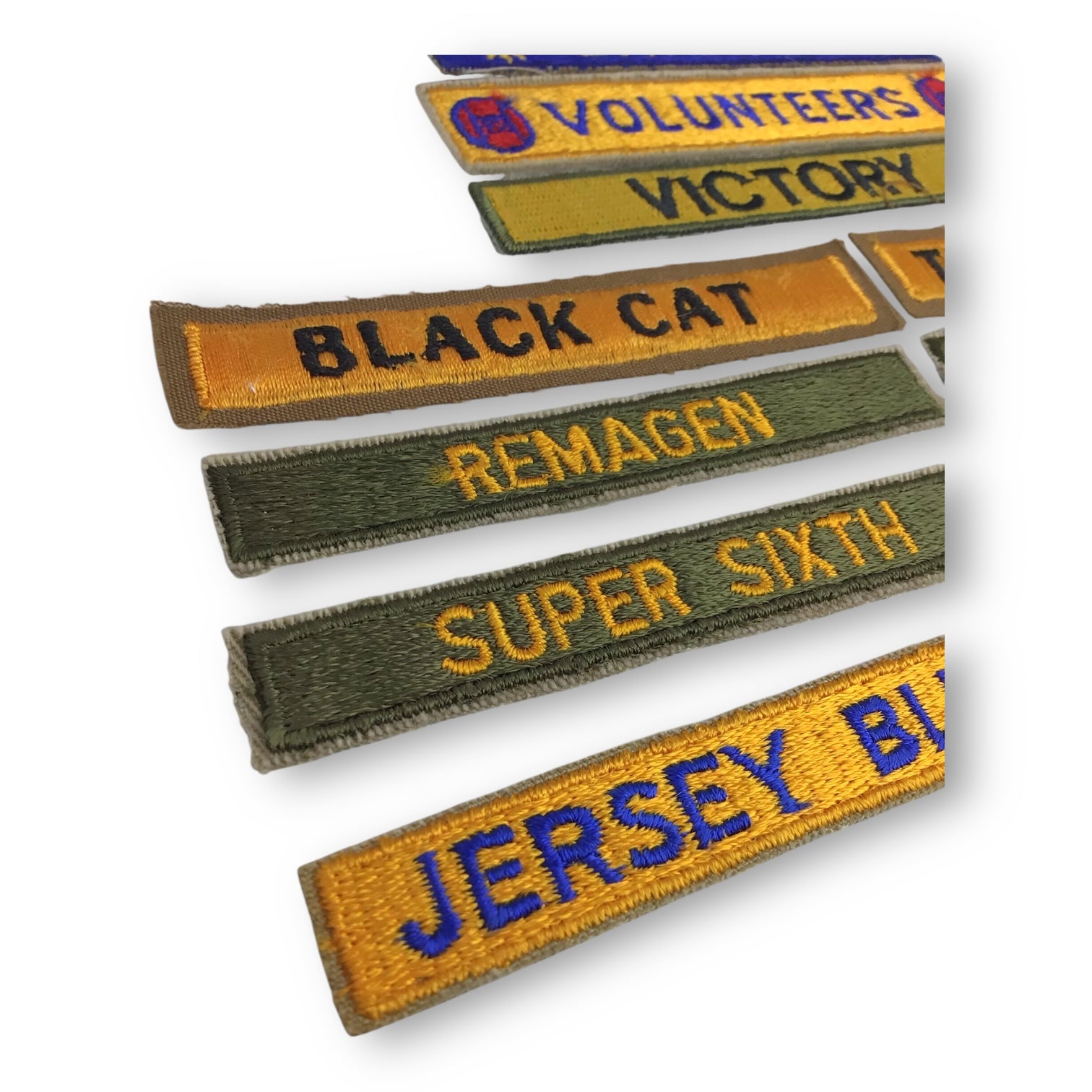 WW2 U.S. Grouping of 16 Armor Shoulder Tabs Some Possibly Theater-Made